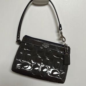 Coach gray glossy embossed wristlet purse